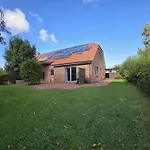 펜션 Komfortferienhaus Deichzauber 노르다히