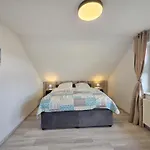 펜션 Komfortferienhaus Deichzauber 노르다히